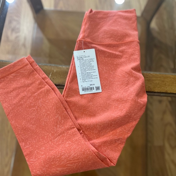Lululemon Wunder Train High-Rise Tight 25"
Crunch Warm Coral - Picture 3 of 4
